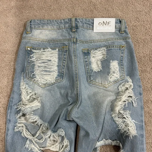 One Above Another Mom Jeans With Extreme Rips - Picture 4 of 4